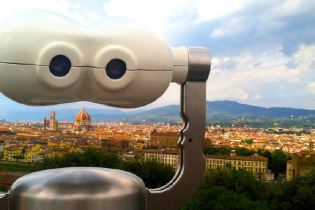 binoculars overlooking city landscape
