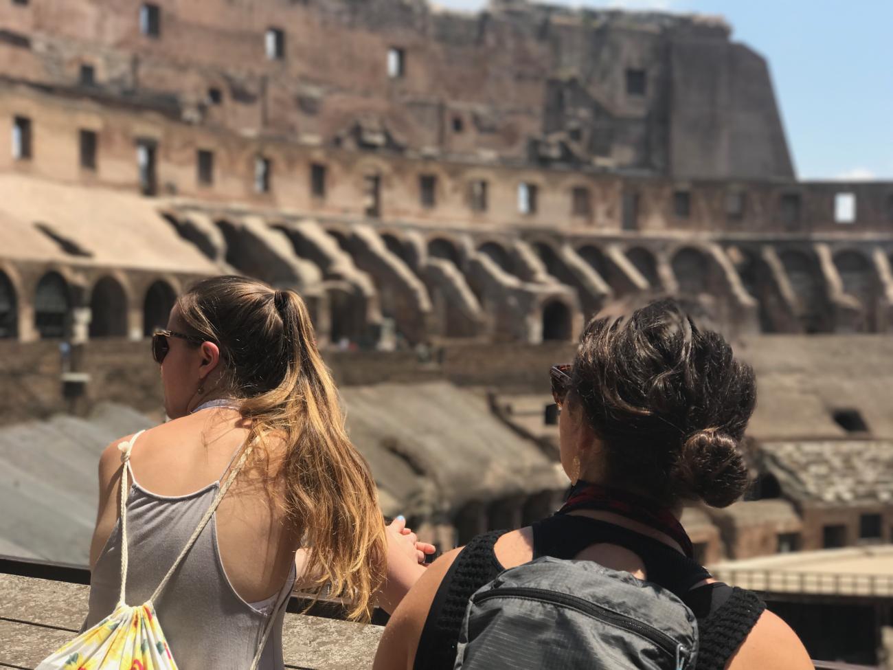 Students looking at a historical site abroad