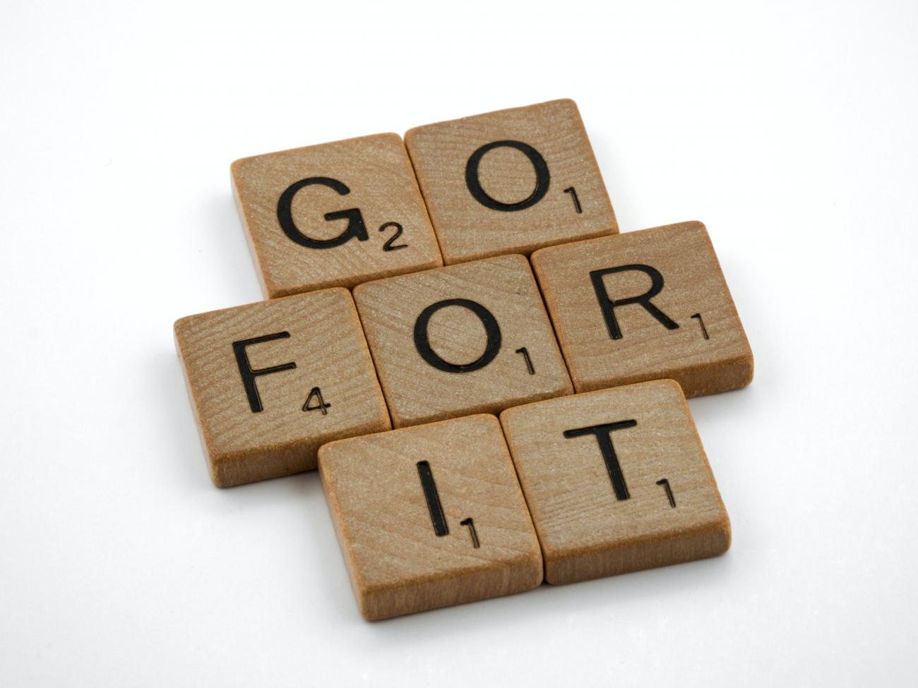 Scrabble tiles that spell out, "GO FOR IT" photo by Brett Jordan 